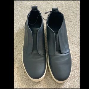 Black slip on sneakers